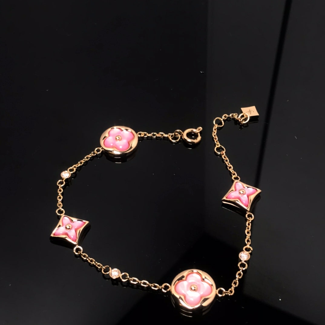 [Edler Schmuck] ARMBAND MIT STERN UND SONNE 4 MOTIV ROSA MOP ROSA GOLD 